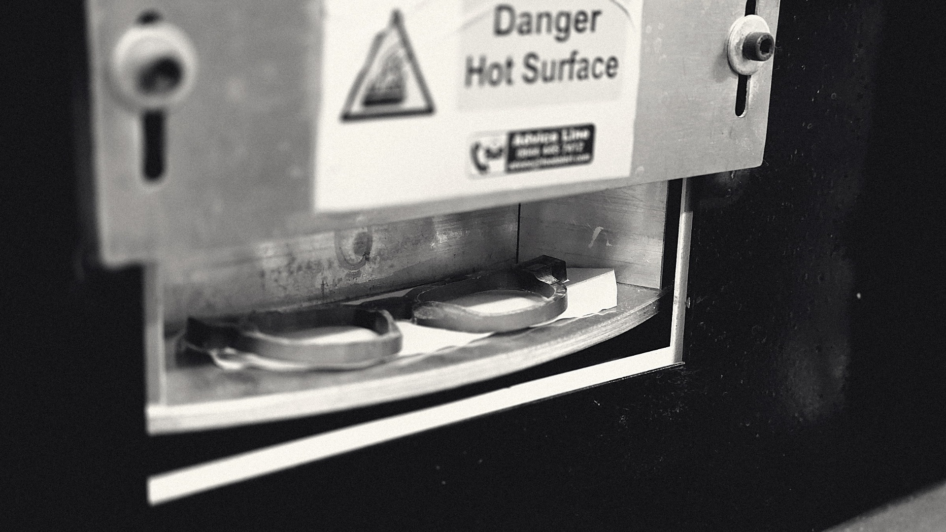 A frame front being warmed in the heat-forming press